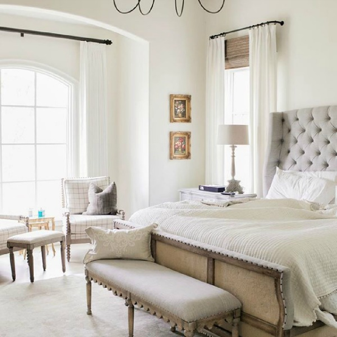 SW Alabaster painted walls in a French country bedroom with tufted headboard and bay window - Brit Jones Design. #CountryFrench #BedroomDecorIdeas