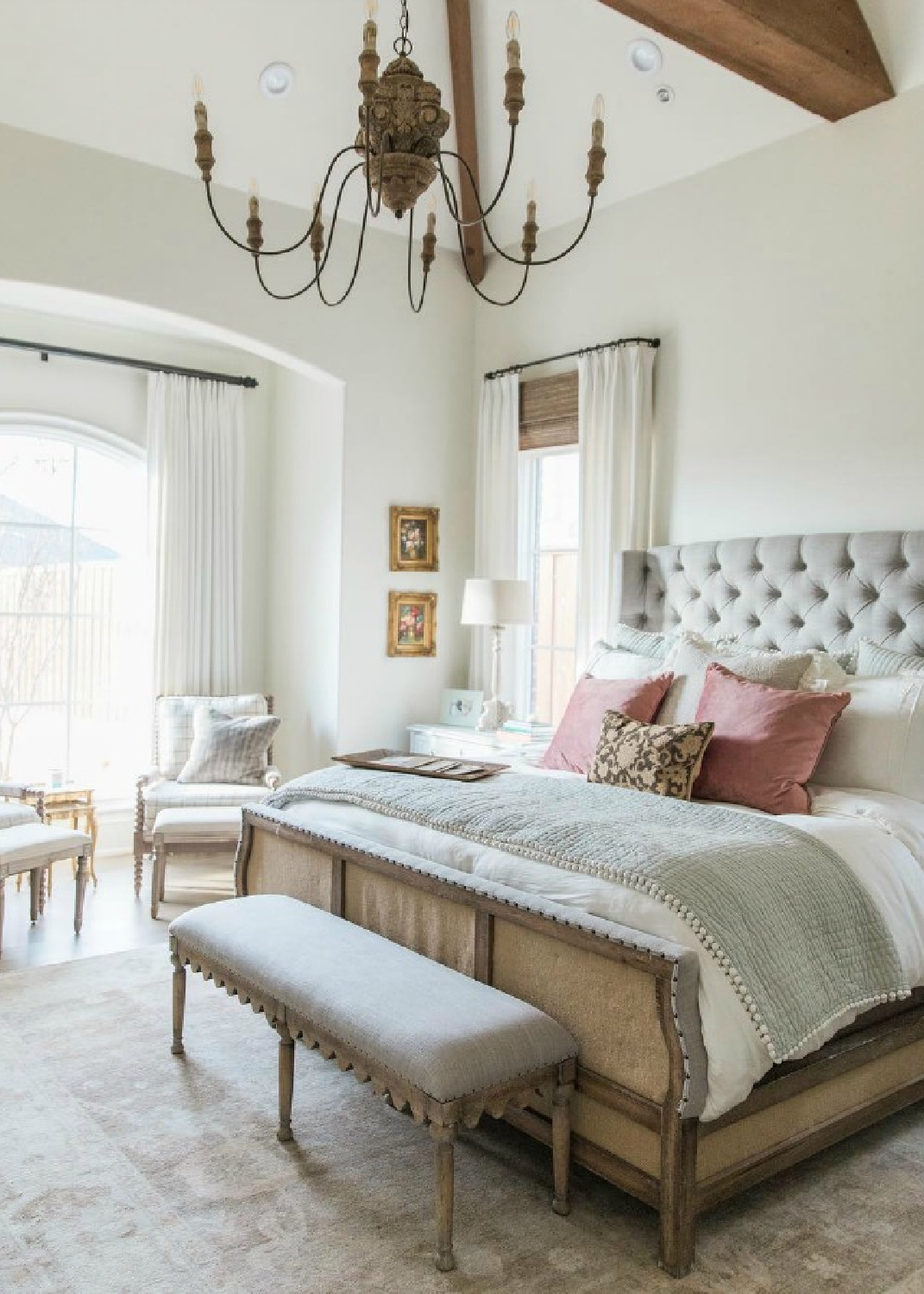 SW Alabaster painted walls in a French country bedroom with tufted headboard and bay window - Brit Jones Design. #CountryFrench #BedroomDecorIdeas