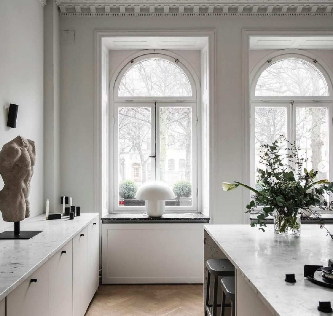 Elegant and chic Stockholm apartment kitchen with magnificent architecture and marble counters - @nordic_design