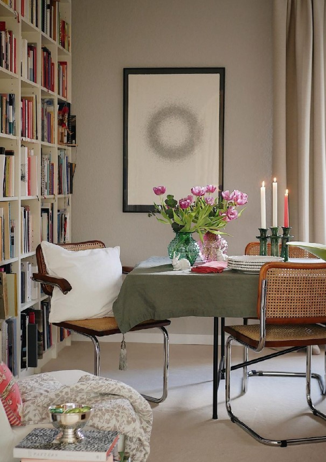 Stony Ground (Farrow & Ball) on walls in a lovely English country dining area with library shelves. #farrowandballstonyground