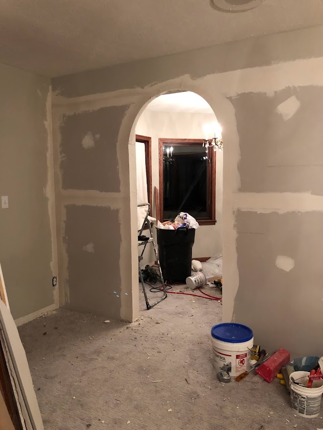 Arched doorway and wall during renovation of bedroom sitting room at the Georgian - Hello Lovely Studio