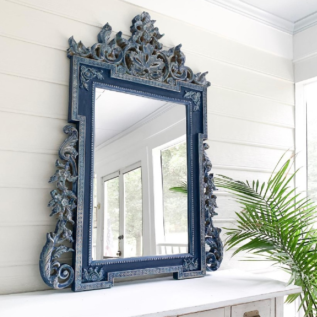 BM China White painted porch with navy blue ornamental mirror - @alicia_slayton.