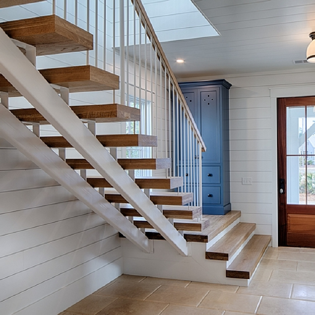 Shiplap walls (painted BM White) in a gorgeous coastal cottage entry with tall blue custom cabinet - come get the details and design resources! #coastalcottage #modernfarmhouse #interiordesign