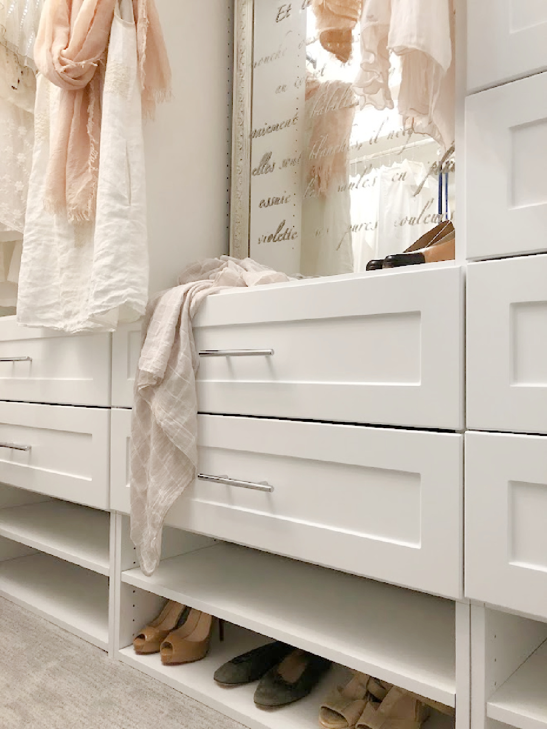 Hello Lovely's DIY custom closet with white Shaker style towers and drawers (Modular Closets). See the before/after photos and find tips for a successful closet upgrade. #diycloset #customclosetideas #closetmakeover #closetmodules #diyclosetmakeover