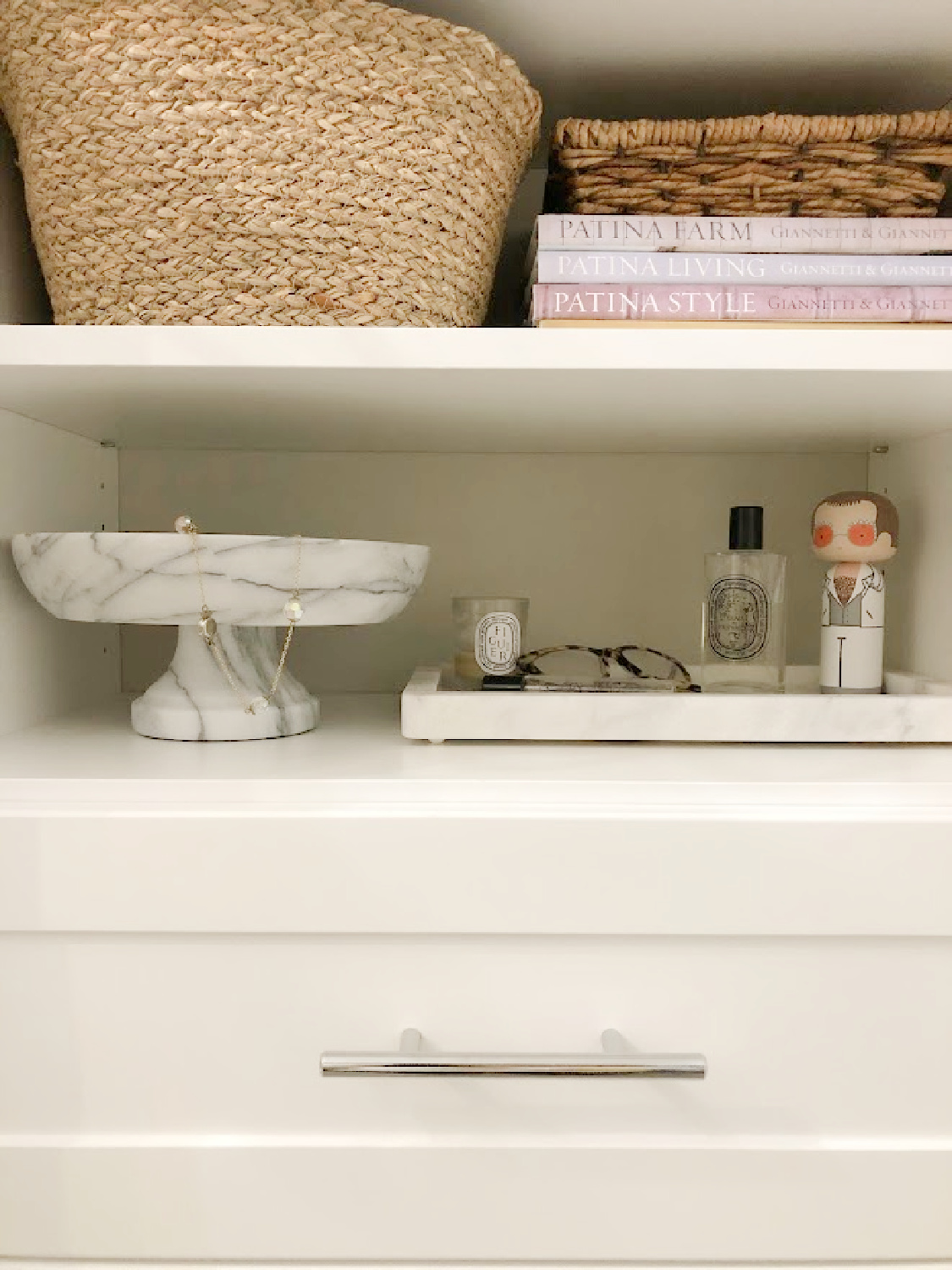 Hello Lovely's DIY custom closet with white Shaker style towers and drawers (Modular Closets). See the before/after photos and find tips for a successful closet upgrade. #diycloset #customclosetideas #closetmakeover #closetmodules #diyclosetmakeover