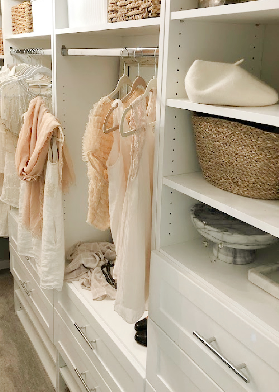 Hello Lovely's before & after walk-in closet shares a custom closet DIY with white Shaker style towers and drawers from Modular Closets. This his and hers closet makes the most of every inch. #closetupgrades #diycloset #customclosetideas #closetmakeover #closetmodules #diyclosetmakeover