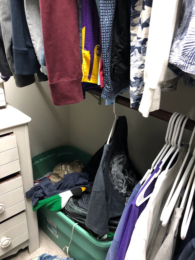 Before - an overflow of belongings in our bedroom's walk-in closet - Hello Lovely.