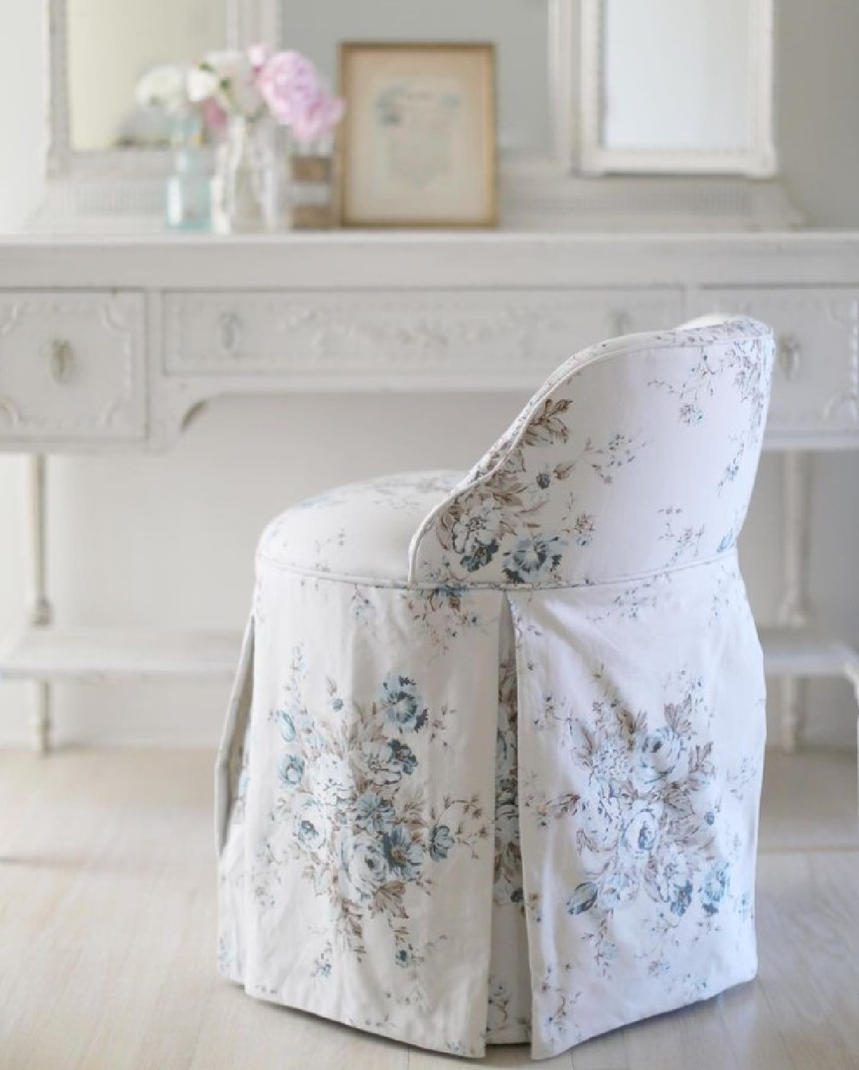 Pipi vanity chair in aqua floral at a vintage vanity - Rachel Ashwell Shabby Chic. #vanitychairs #shabbychicdecor #romanticflorals #dressingrooms