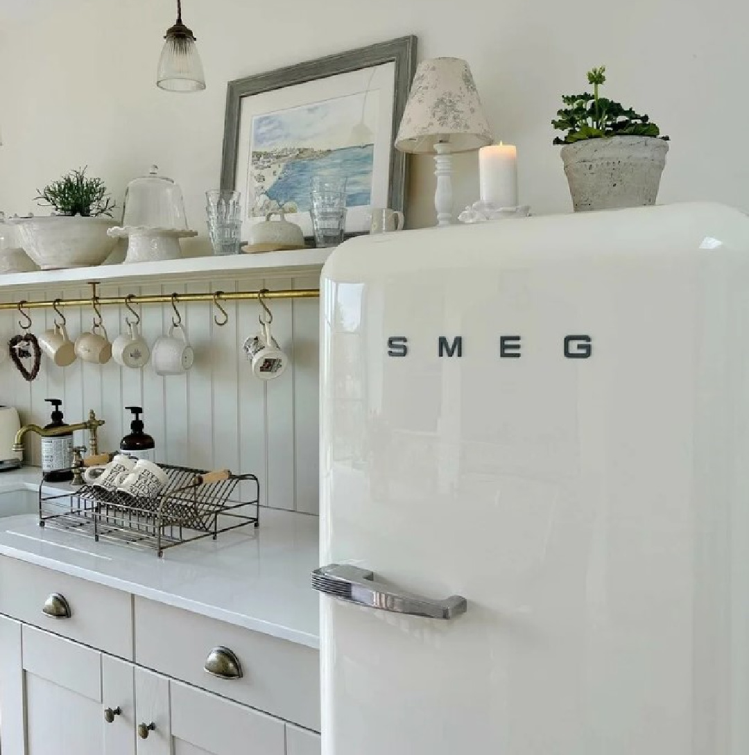 Wimborne White (Farrow & Ball 239) in a beautiful English country kitchen with Smeg frig - @hugsandhearts_ #wimbornewhite #farrowandballwimbornewhite