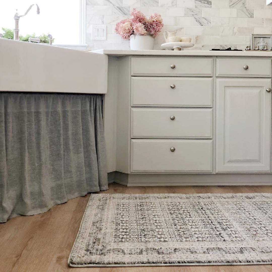 Amber Lewis x Loloi runner rug in my modern French kitchen with farm sink and Pavilion Gray painted cabinets - Hello Lovely Studio. #modernfrench #greykitchens #viateramuse