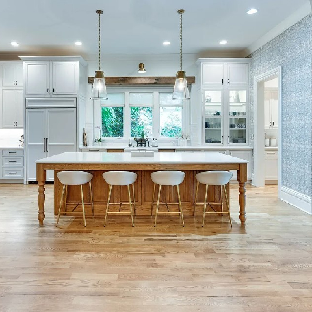 Stunning kitchen with two tone cabinetry, farm sink, and traditional style within a historic 1870 home (Murfreesboro Rd) in Franklin, TN. #farmhousekitchens