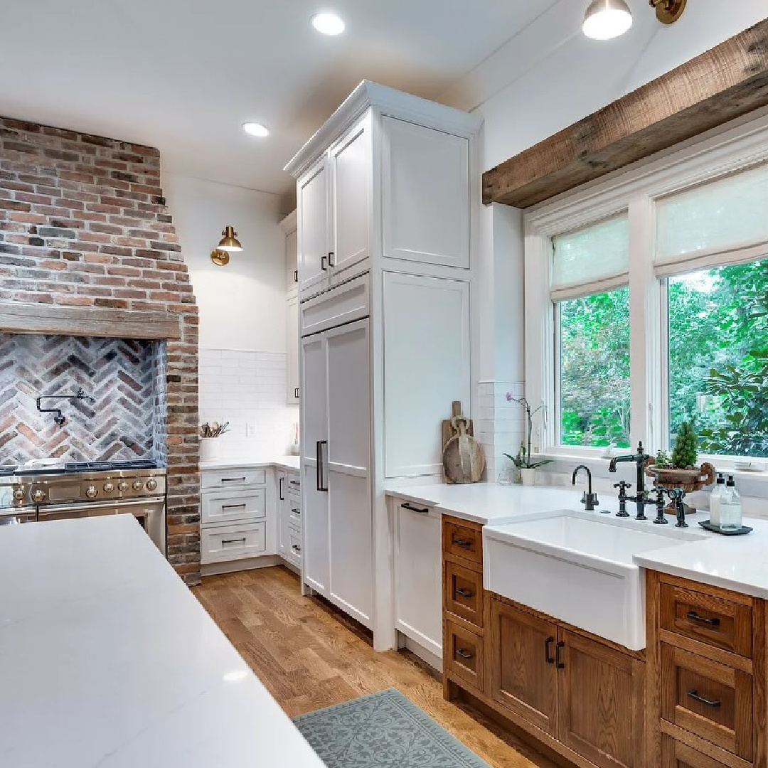 Stunning kitchen with two tone cabinetry, farm sink, and traditional style within a historic 1870 home (Murfreesboro Rd) in Franklin, TN. #farmhousekitchens