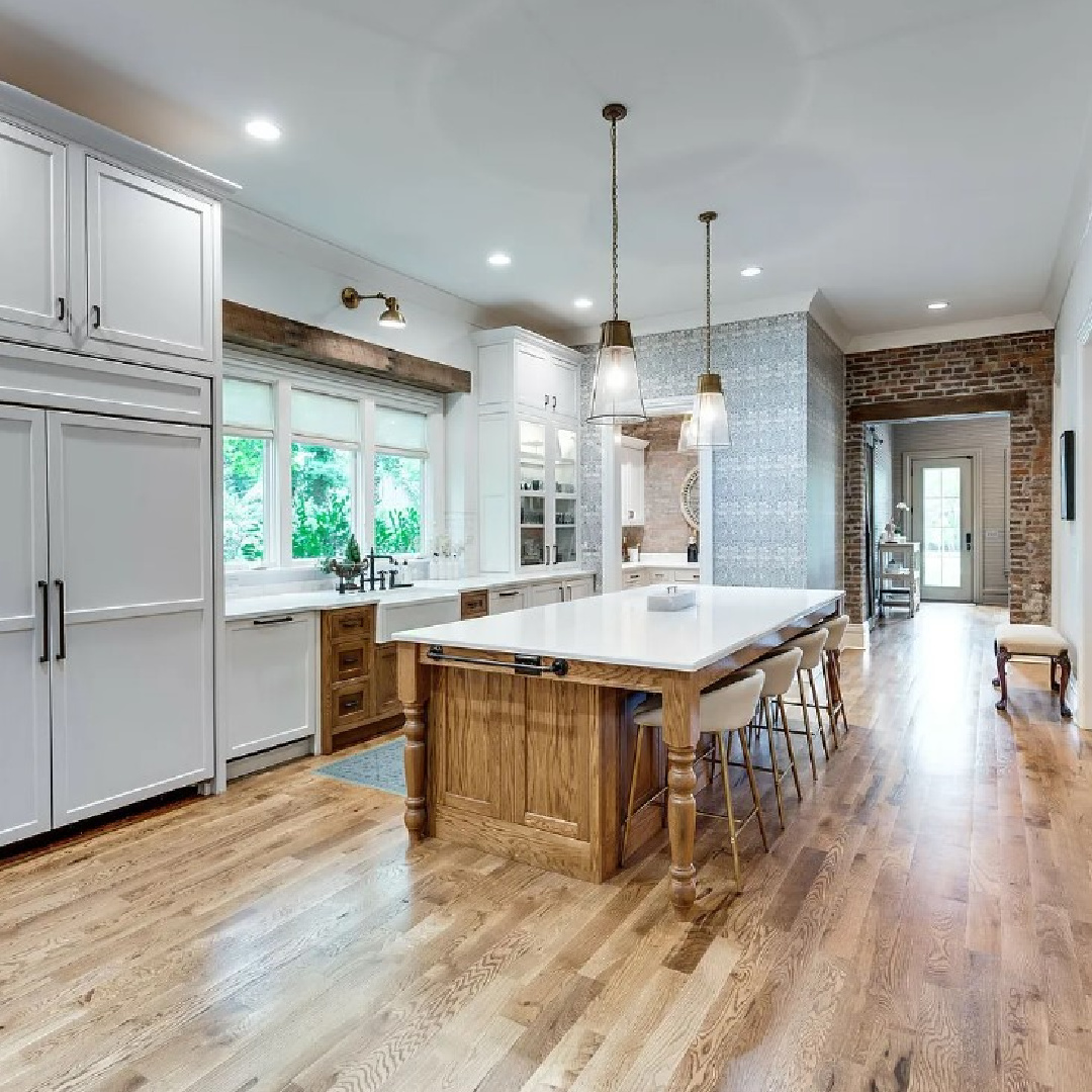 Stunning kitchen with two tone cabinetry, farm sink, and traditional style within a historic 1870 home (Murfreesboro Rd) in Franklin, TN. #farmhousekitchens