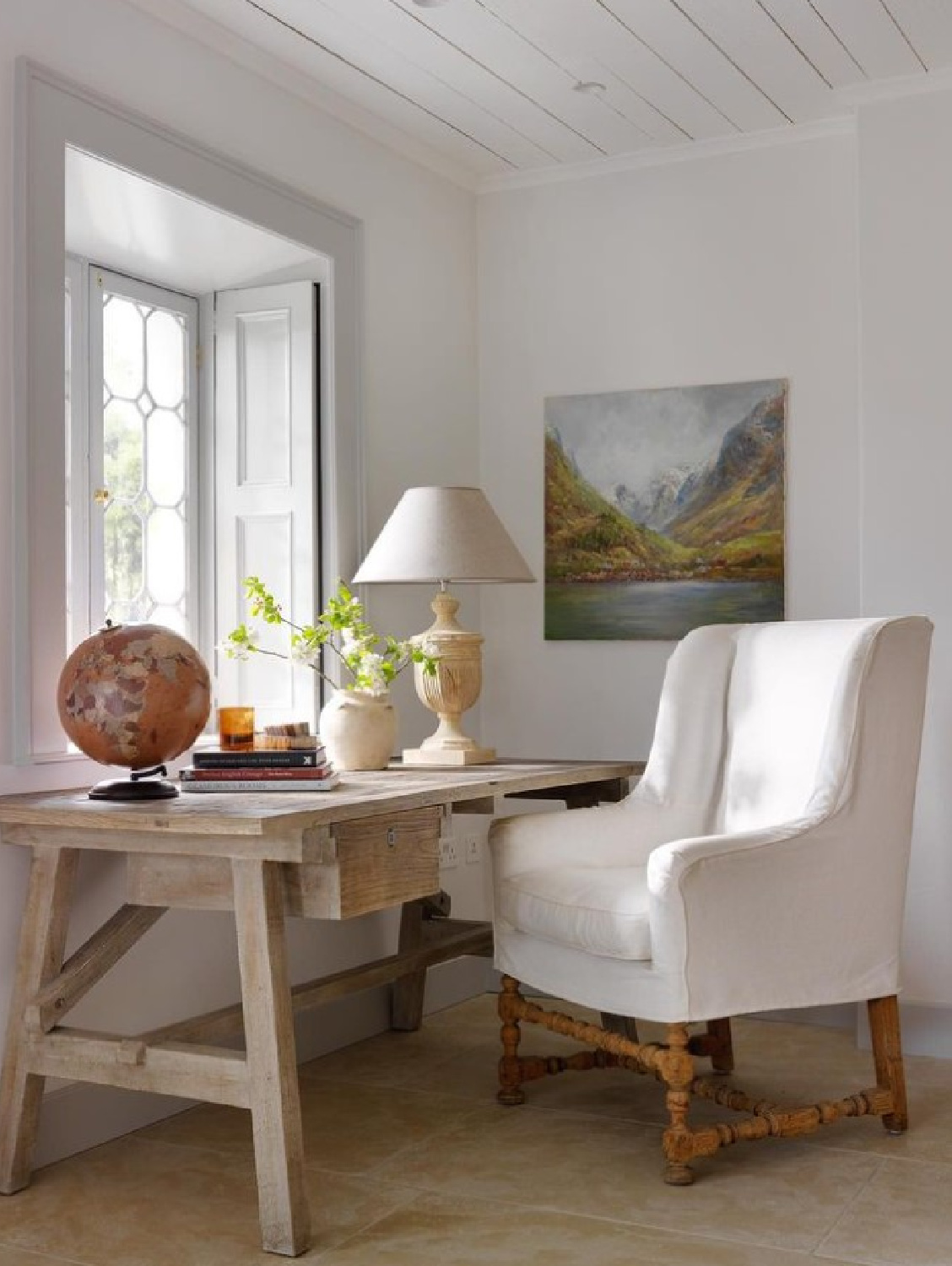 @minniepetersdesign - Beautiful Belgian linen wing chair and rustic wood desk. #belgianinteriors