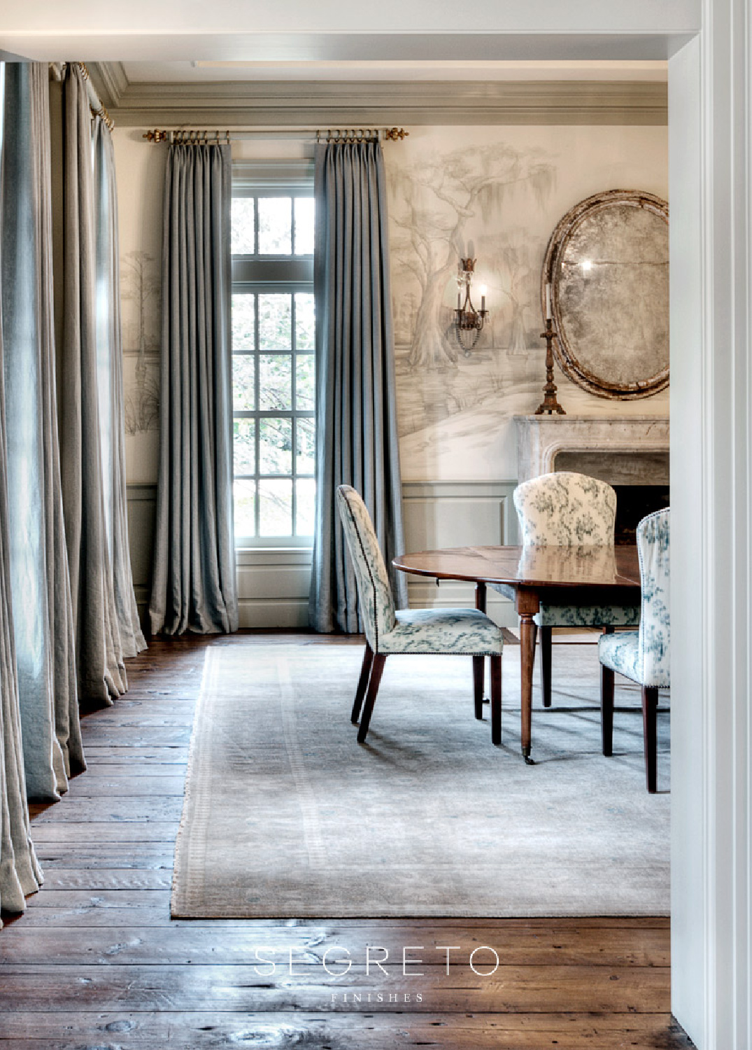 Beautiful traditional style dining room with mural by Segreto Finishes.