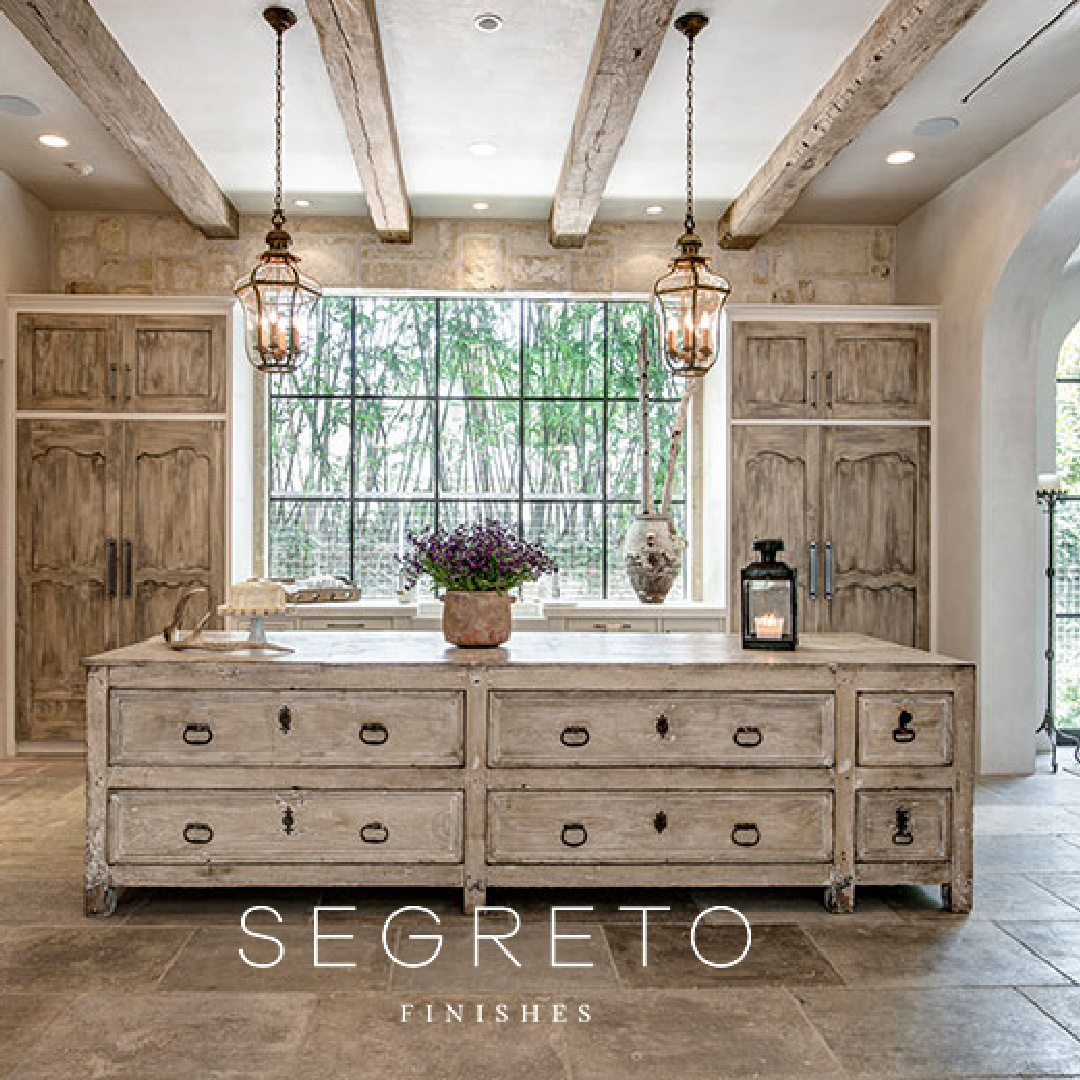 Old World style French country kitchen with antiques, reclaimed materials, and finish work by Segreto Finishes.