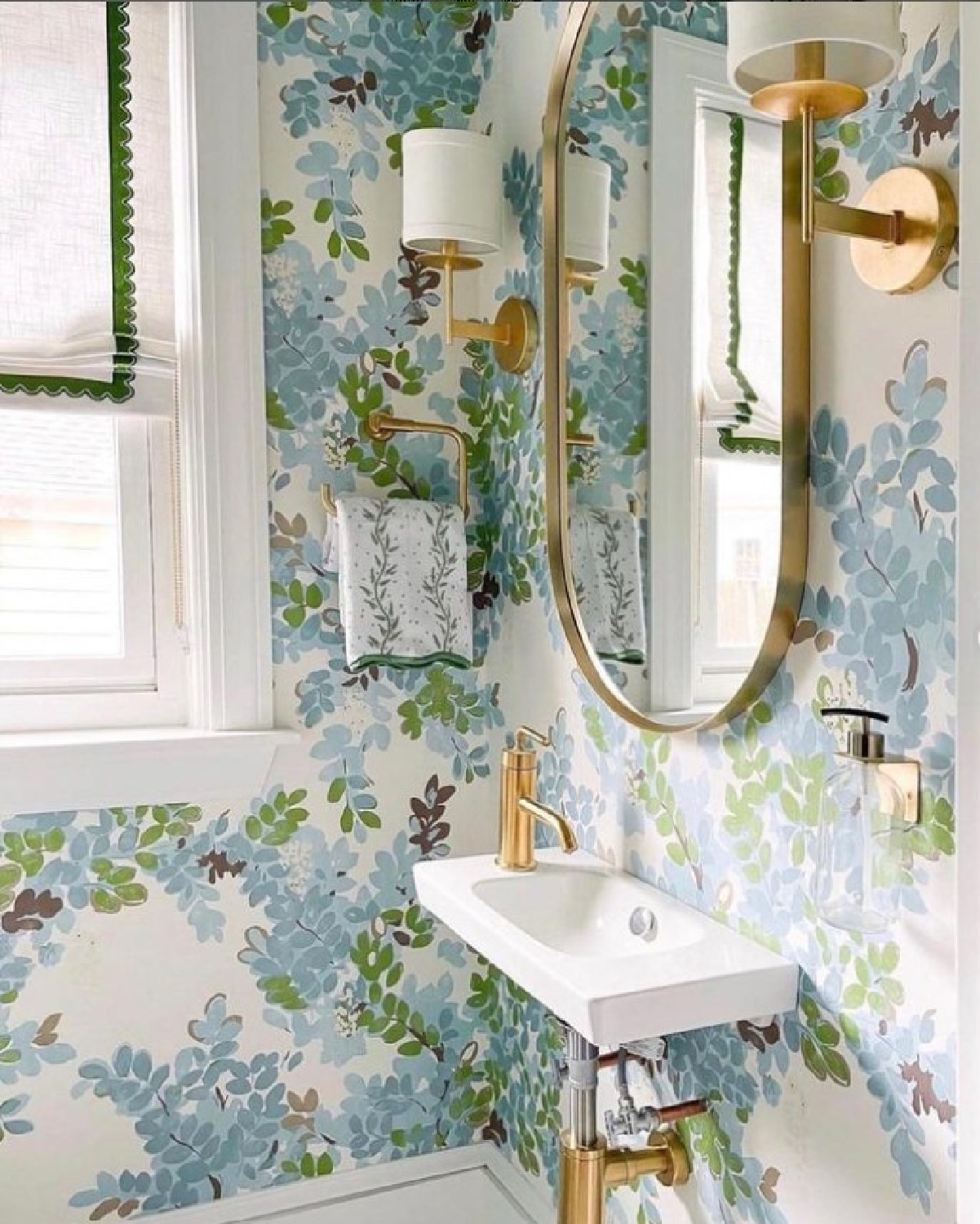 @blakelyinteriordesign - beautiful blue and green wallpaper in a powder bath. #bathroomdesign #bathroomwallpaper