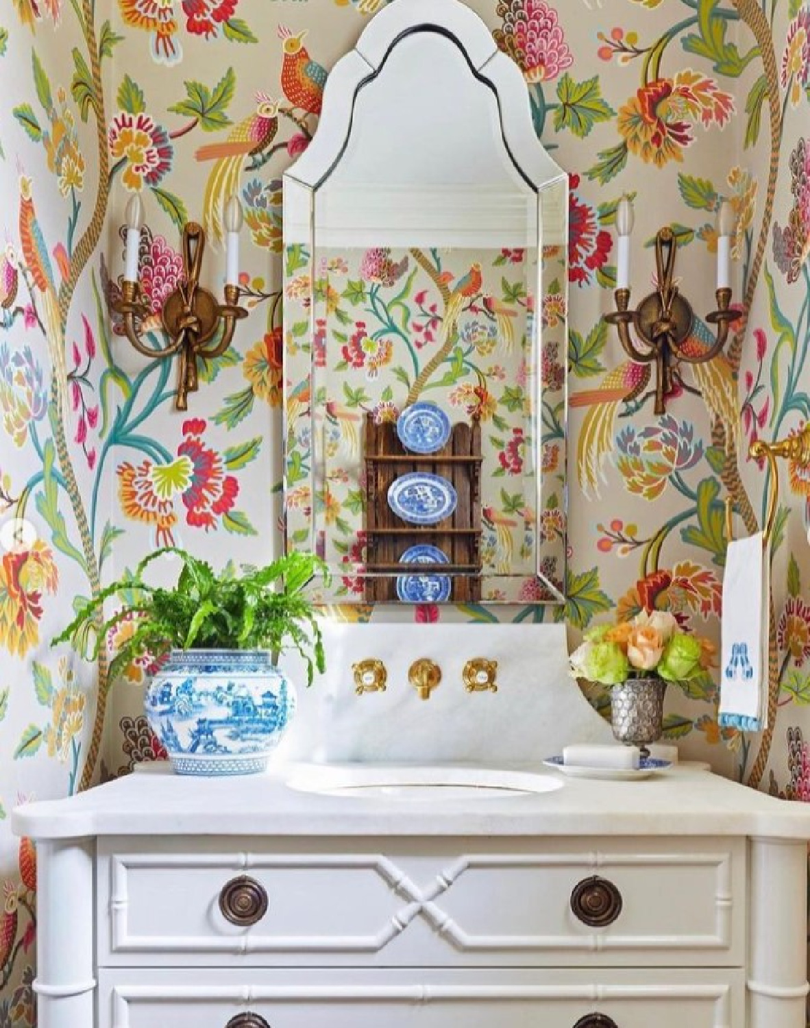 @couturehouseinteriors - Beautiful bath with a whimsical Thibaut wallpaper. #bathroomdesign #bathroomwallpaper
