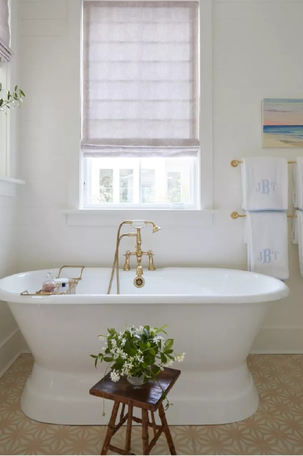 Soaking tub with brass fixtures in a traditional Charleston home - Julia Berolzheimer's home in Southern Living (photo: Hector Manuel Sanchez).