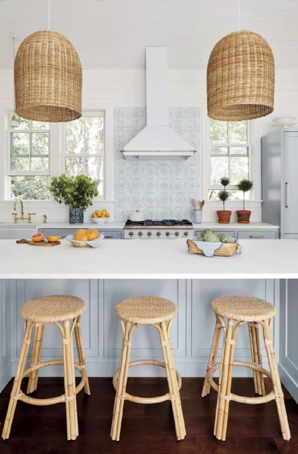 Farrow & Ball Parma Gray kitchen cabinets, La Cornue range, and Tabarka Studio tiled backsplash - Torrance Mitchell - Julia Berolzheimer's home in Southern Living (photo: Hector Manuel Sanchez). #farrowandballparmagray #bluekitchens #charlestonkitchens #traditionalstyle