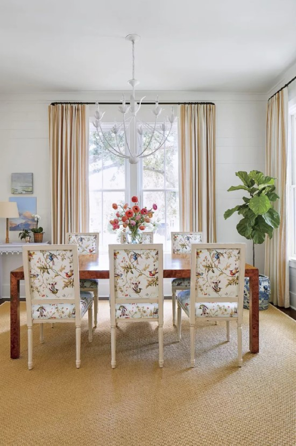 Charming Charleston traditional dining room with modern Parsons table, Ballard Designs chairs upholstered in Cole & Sons - Julia Berolzheimer's home in Southern Living (photo: Hector Manuel Sanchez). #bmsimplywhite