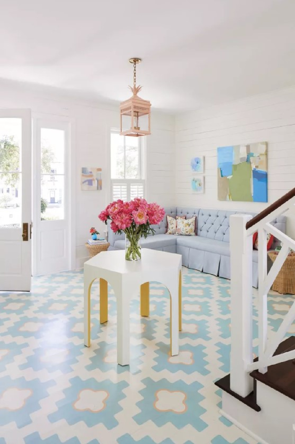 Whimsical handpainted turquoise hardwood floor (Suzanne Allen) in entry of charming Charleston home - Julia Berolzheimer's home in Southern Living (photo: Hector Manuel Sanchez). #bmsimplywhite #paintedfloor