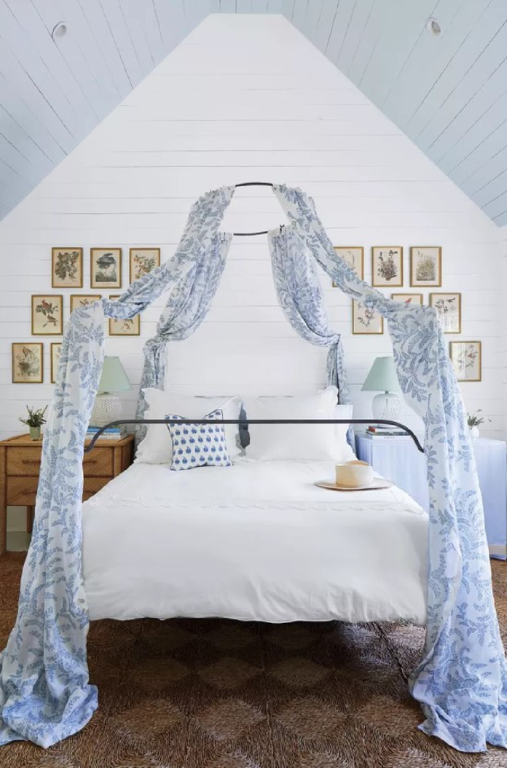 Lofty ceilinged bedroom with Colefax & Fowler Melina fabric and vintage framed bird prints - Julia Berolzheimer's home in Southern Living (photo: Hector Manuel Sanchez). #bmsimplywhite