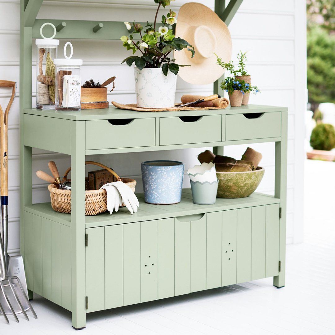 Sage green Potting station from Julia Berolzheimer collection with Pottery Barn. #pottingbench #gardeningfurniture