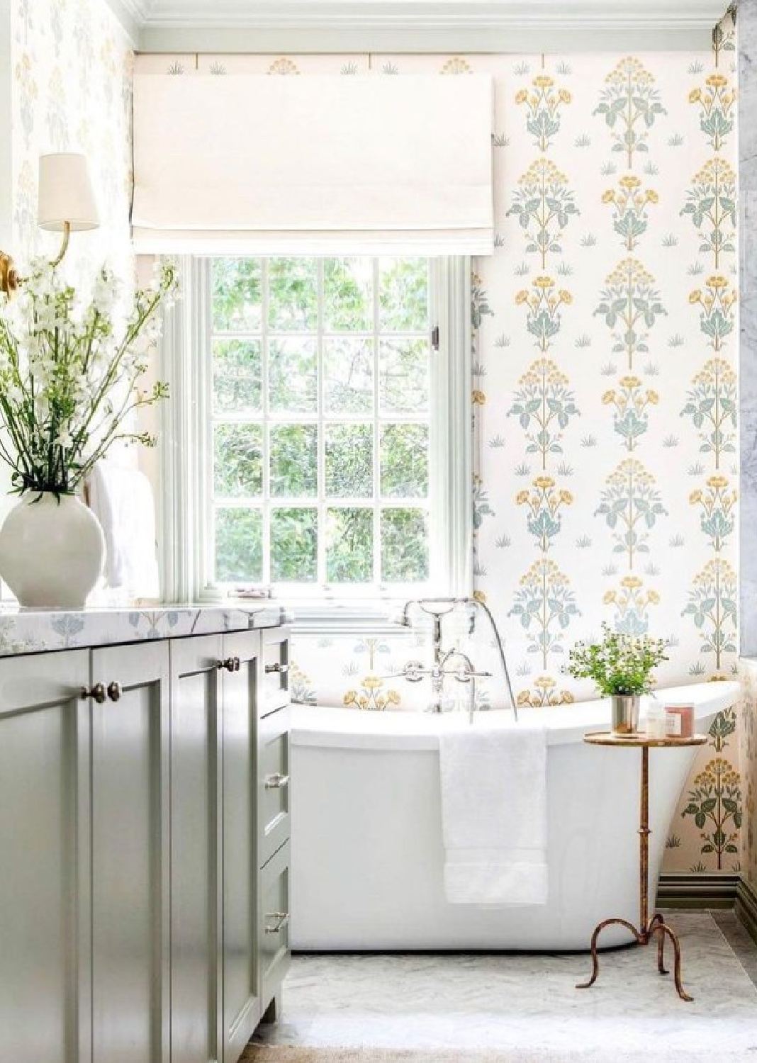 @katiedavisdesign - beautiful wallpapered bath with light blue, gold, and white. #bathroomdesign #bathroomwallpaper