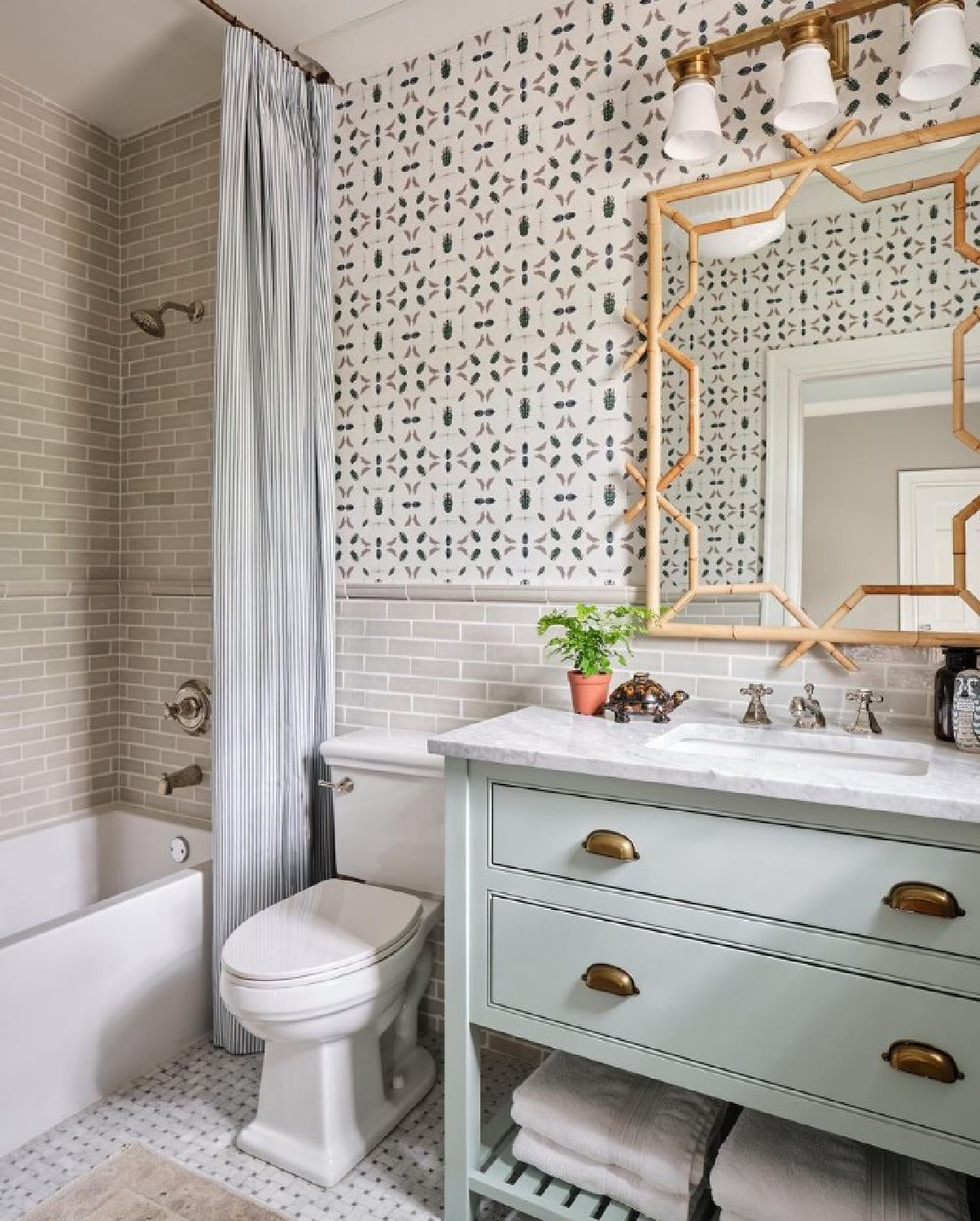 Behr Fountain Falls painted bath vanity - in Maria E. Beck's 1931 renovated Texas home. #traditionalstyle #behrmountainfalls #timelessdesign