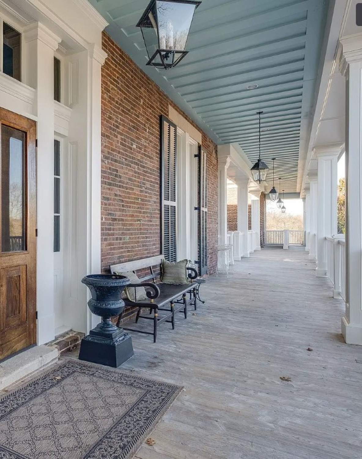 Haint blue ceiling on front porch of a beautiful 1836 historic home on Old Hillsboro in Franklin, TN.