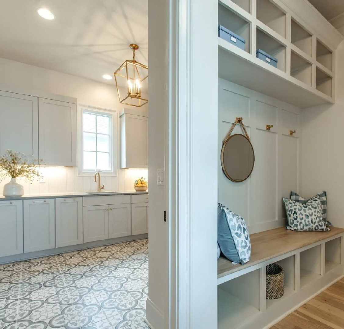 Beautiful laundry with tile floor and mud room with built-ins in a Sipple Home on Pasquo in Franklin, TN.