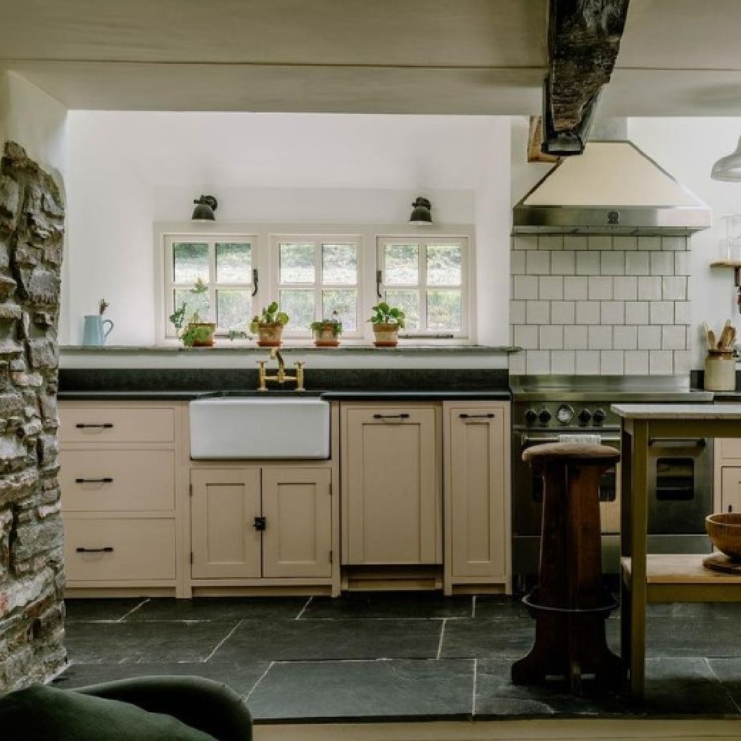 Beautiful English country kitchen with cabinets painted Setting Plaster and walls Wimborne White by Farrow & Ball - @penlancottagebrecon. #englishcountrykitchen #farrowandballsettingplaster #farrowandballwimbornewhite