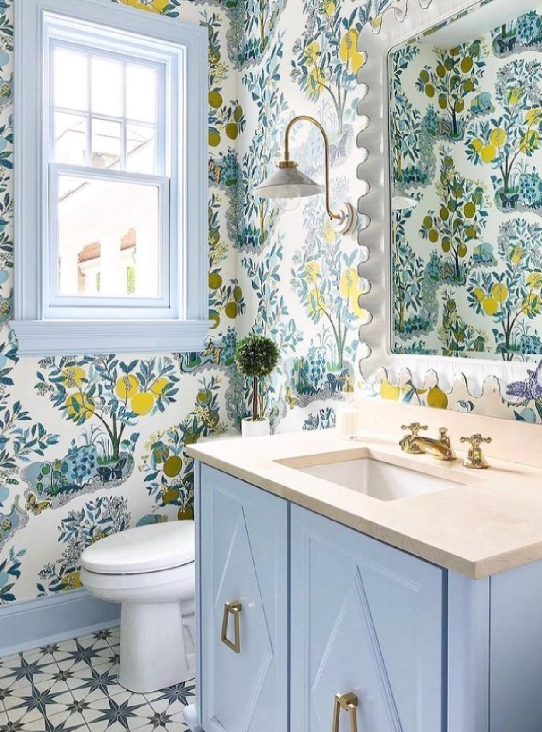 @sarahvailedesign - Blue wallpaper with lemon tree motif in a bath. #bathroomdesign #bathroomwallpaper