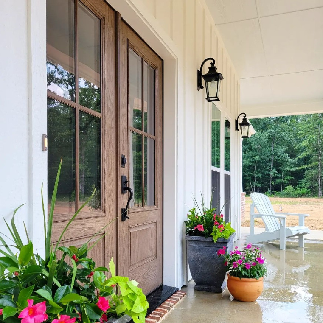 @trailsendfarmhouse - SW Pure White 7005 on a beautiful house exterior with SW Topsaid on porch ceiling.. #swpurewhite #whitehouseexterior #whitefarmhouses