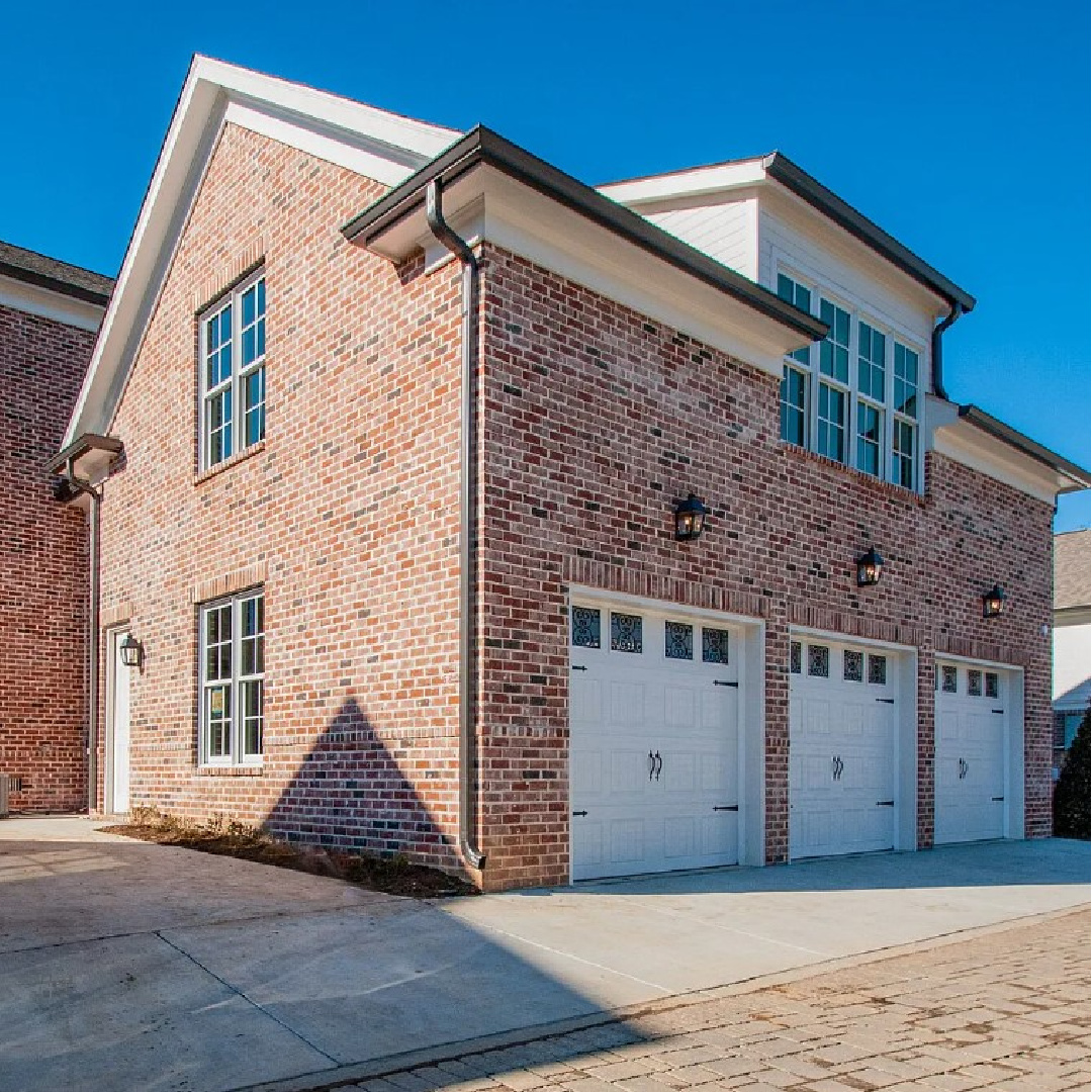 Red brick detached 3 car garage on Stephens Valley in Franklin, TN. #garagearchitecture