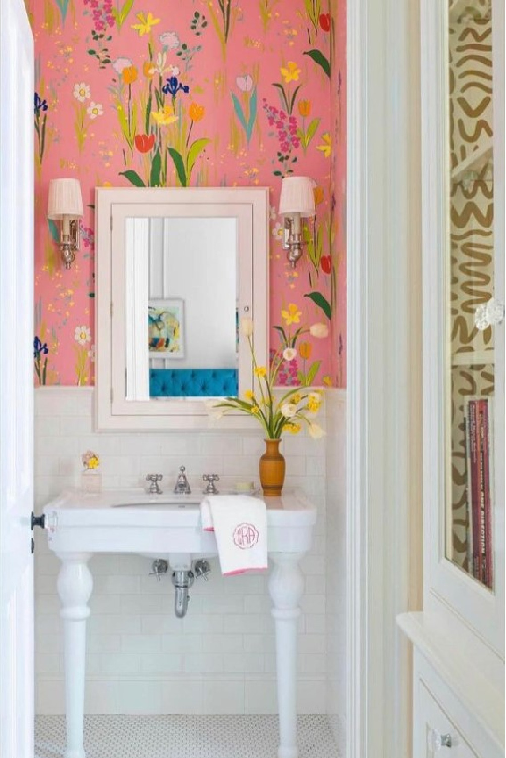 Summer Thornton designed bath with gorgeous bright pink floral wallpaper - photo by Annie Schlechter. #wallpaperedinteriors #bathroomwallpaper