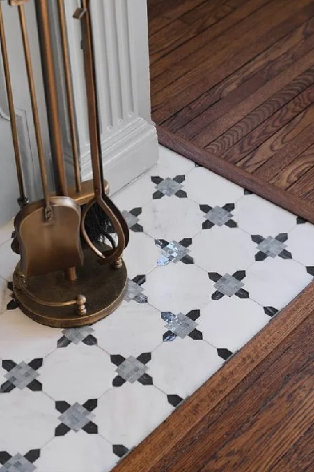 Detail of tile on hearth of fireplace in primary bedroom of Fixer Upper The Castle renovation.