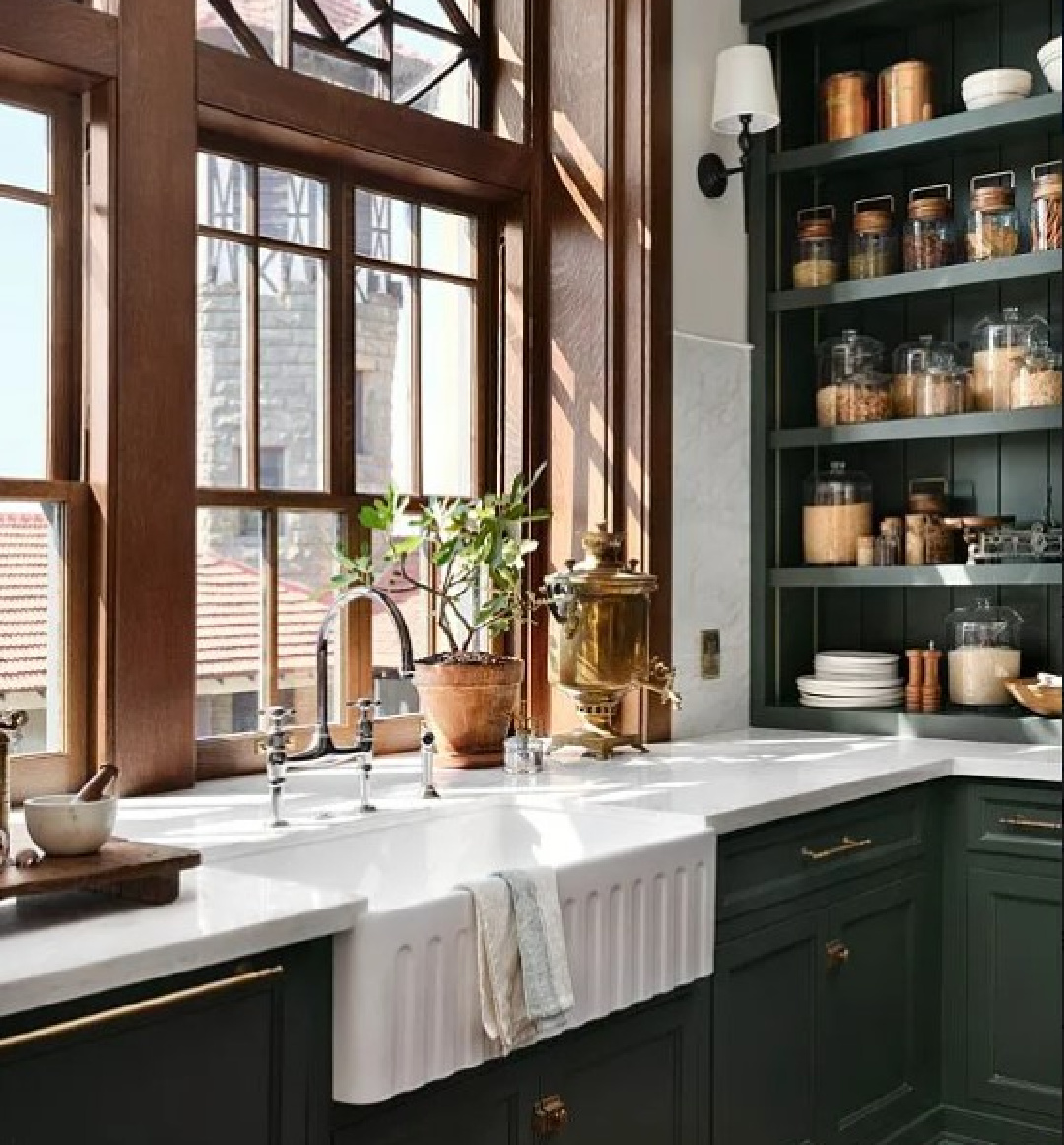 Cottage Grove (a moody navy with deep green paint color by Kilz - Magnolia's Castle Collection by Joanna Gaines) in butler pantry of Fixer Upper The Castle (Waco, TX). #thecastle #fixerupperthecastle