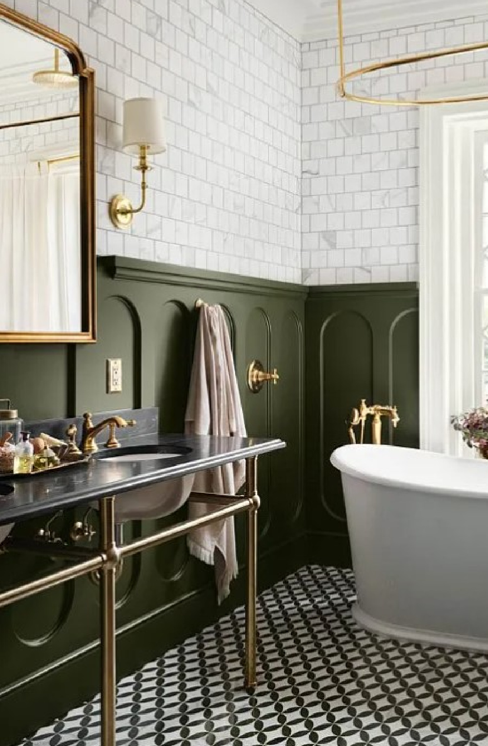 Step Stool Green (an olive green paint color by Kilz - Magnolia's Castle Collection by Joanna Gaines) on paneled walls in a bath with subway tile in Fixer Upper The Castle (Waco, TX). #thecastle #fixerupperthecastle