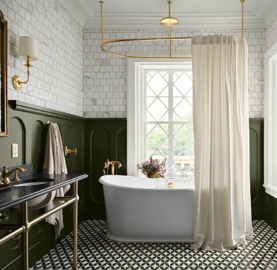 Step Stool Green (an olive green paint color by Kilz - Magnolia's Castle Collection by Joanna Gaines) on paneled walls in a bath with subway tile in Fixer Upper The Castle (Waco, TX). #thecastle #fixerupperthecastle