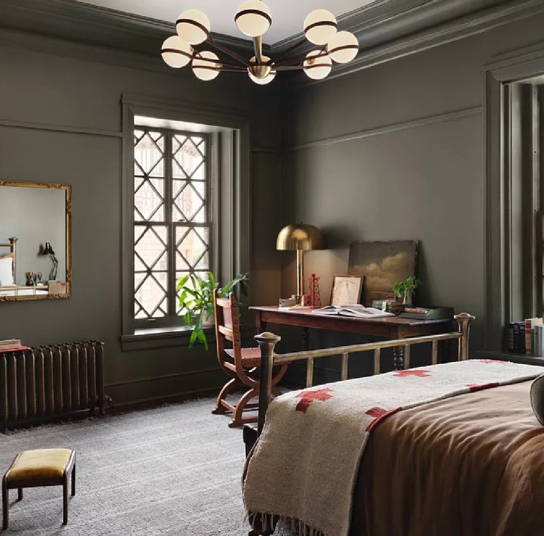 Estate (a deep sage green-gray by Kilz - Magnolia's Castle Collection by Joanna Gaines) on walls of handsome deep green bedroom in Fixer Upper The Castle (Waco, TX). #thecastle #fixerupperthecastle