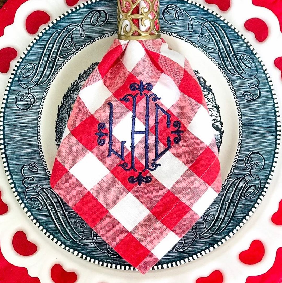 SBMonograms on Etsy - 4th of July monogrammed red check napkin on a beautiful blue plate. #4thofjulytablescape. #monogrammednapkins