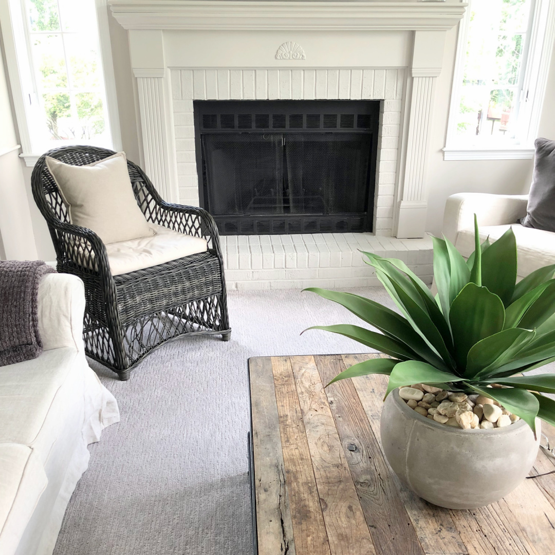 SW Agreeable Gray in tonal family room with built-ins and Belgian linen - Hello Lovely Studio. #swagreeablegray