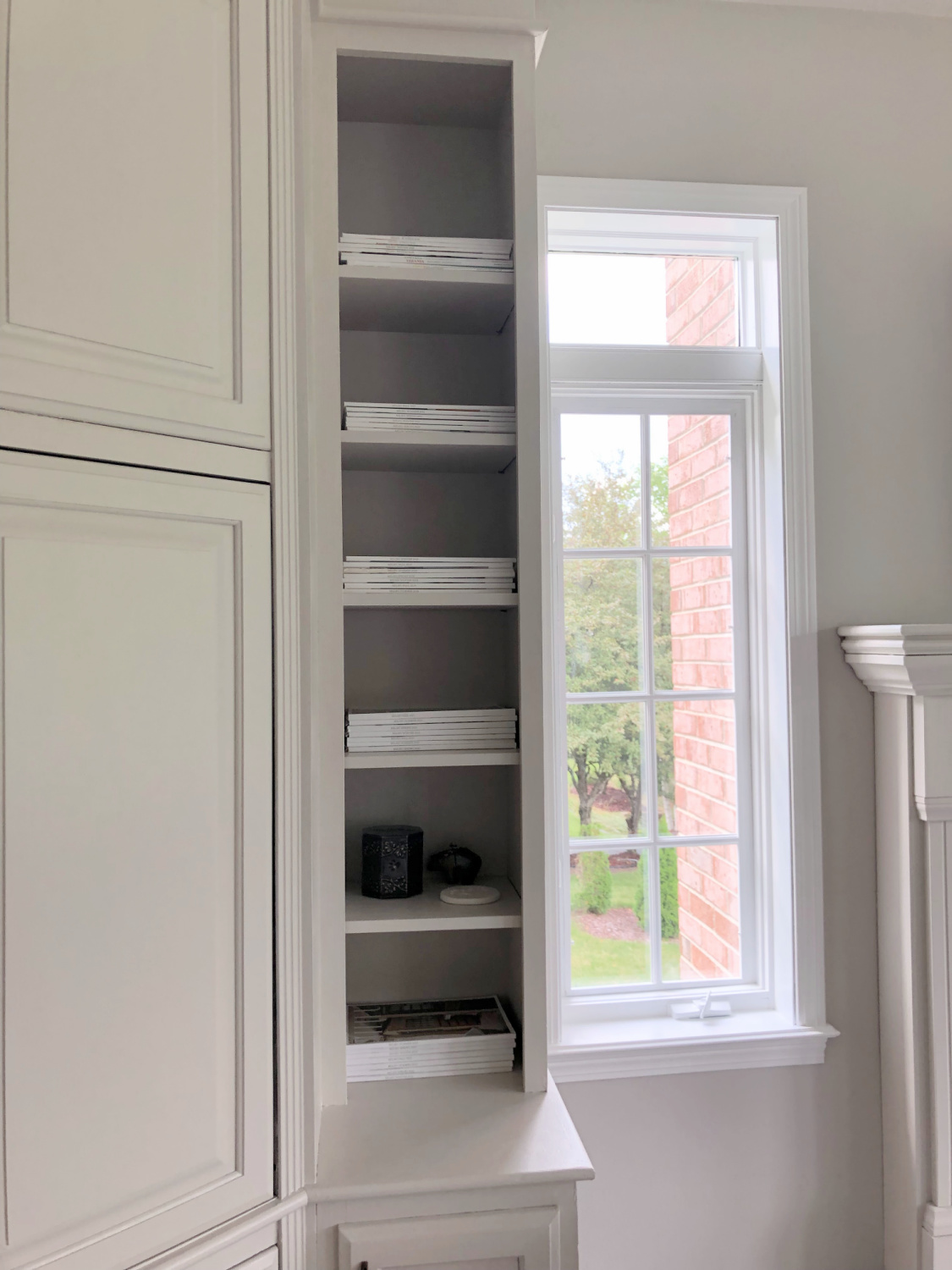 SW Agreeable Gray in tonal family room with built-ins and Belgian linen - Hello Lovely Studio. #swagreeablegray