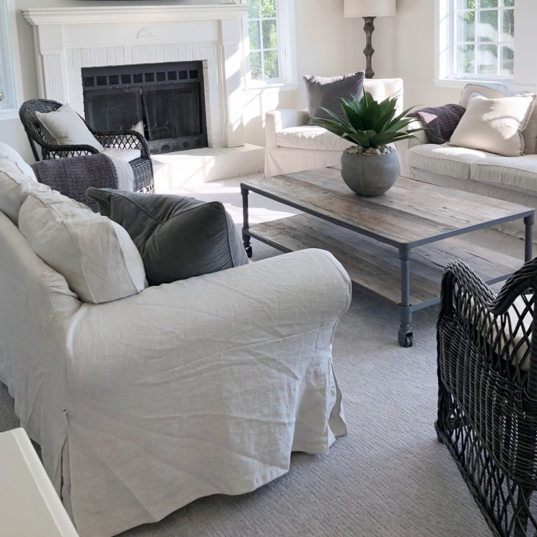 SW Agreeable Gray in tonal family room with built-ins and Belgian linen - Hello Lovely Studio. #swagreeablegray