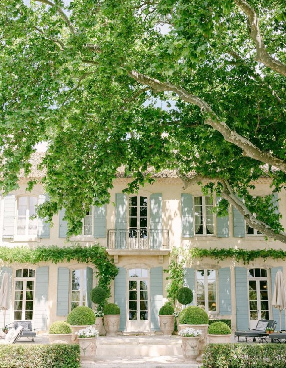 Provence Poiriers - photo by @brunorezza - a lovely Provencal French farmhouse with shutters, topiaries, and breathtaking gardens. #provencepoiriers