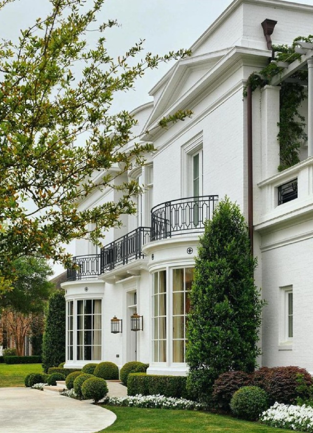 @curtisandwindham - White house exterior with beautiful curved bay windows and balconies. #classicarchitecture #whitehouses #whitehouseexteriors