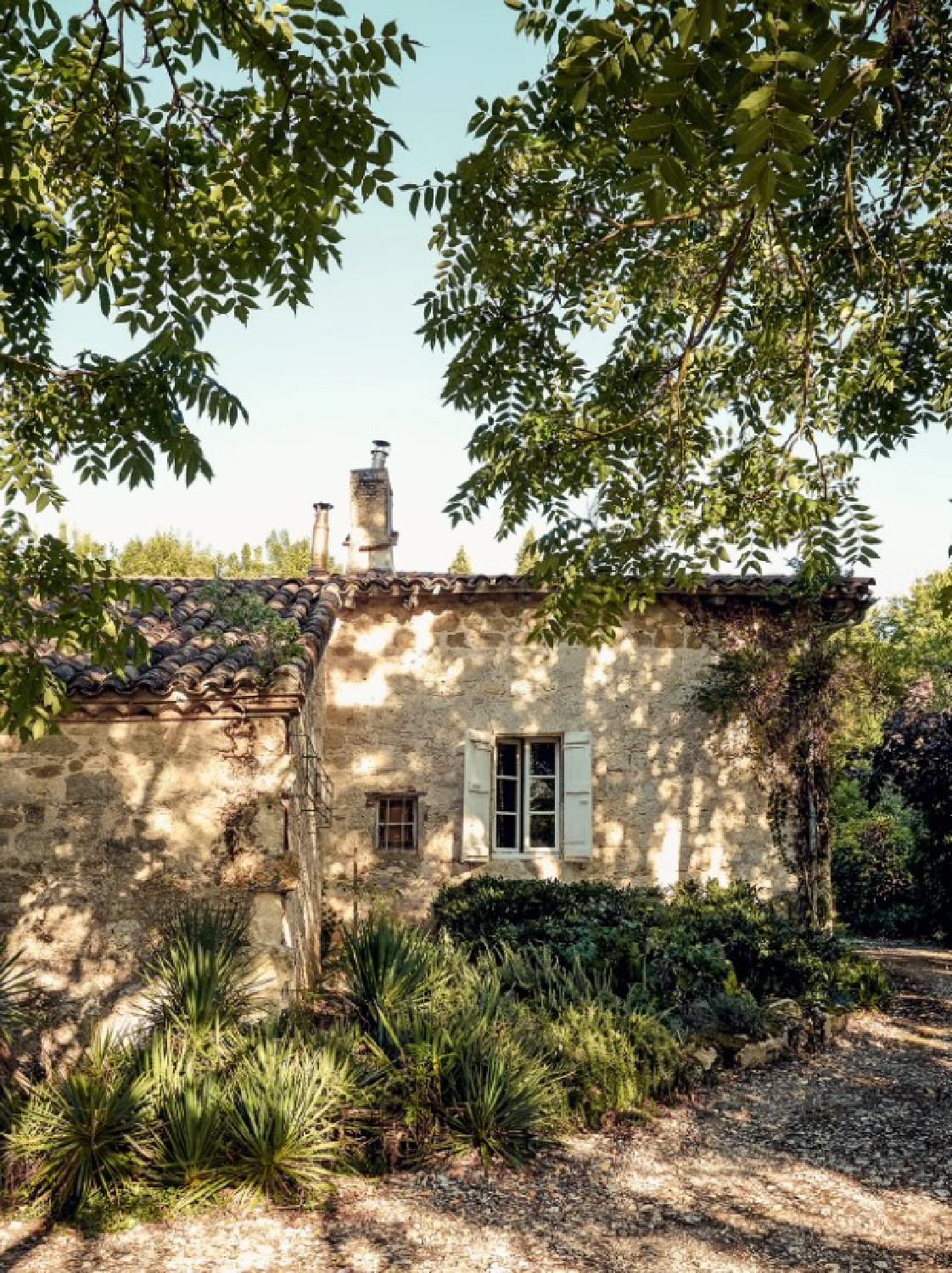 Pale stone on exterior of a 19th century French cottage in Toulouse by Lucinda Chambers - photo by Paul Massey. #frenchcottage #stonecottages