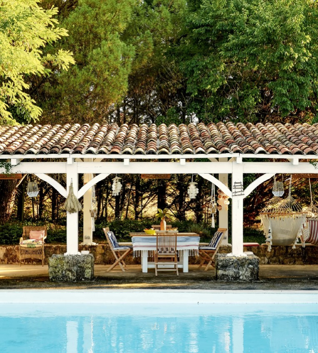 Pool and covered patio at a 19th century French cottage in Toulouse by Lucinda Chambers - photo by Paul Massey. #frenchcottage #frenchfarmhouse #interiordesignl